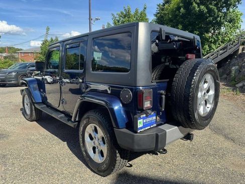 Used 2013 Jeep Wrangler Unlimited Sahara w/ Dual Top Group AWD/4WD image 4