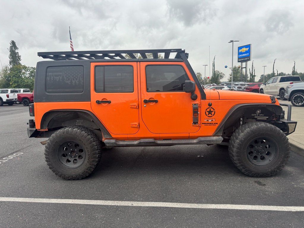Used 2012 Jeep Wrangler Unlimited Sahara w/ Connectivity Group AWD/4WD image 3