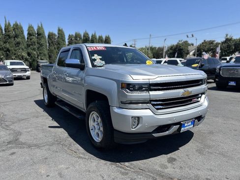 Used 2017 Chevrolet Silverado 1500 LTZ Z71 w/ LTZ Plus Package AWD/4WD image 1