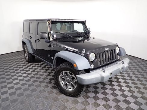 Used 2014 Jeep Wrangler Unlimited Rubicon w/ Dual Top Group AWD/4WD image 5