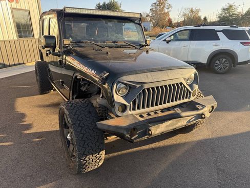 Used 2011 Jeep Wrangler Unlimited Rubicon w/ Dual Top Group AWD/4WD image 4