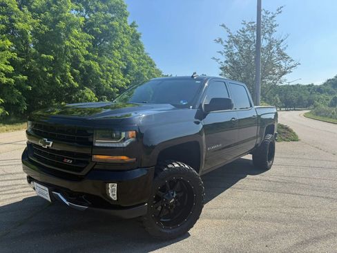Used 2017 Chevrolet Silverado 1500 LT w/ LPO, Black Pack AWD/4WD image 1