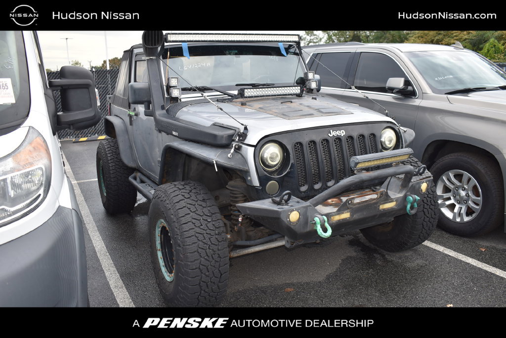 Used 2013 Jeep Wrangler Sport AWD/4WD image 1