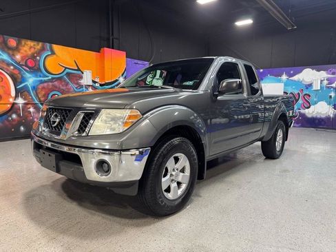 Used 2009 Nissan Frontier SE w/ SE Value Truck Pkg AWD/4WD image 1
