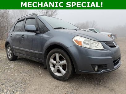 Used 2009 Suzuki SX4 AWD Hatchback w/ Touring Pkg