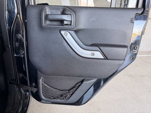 Used 2014 Jeep Wrangler Unlimited Sahara AWD/4WD image 16