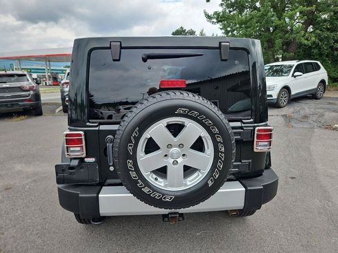 Used 2012 Jeep Wrangler Unlimited Sahara w/ Dual Top Group AWD/4WD image 4