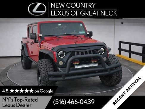 Used 2016 Jeep Wrangler Unlimited Sport image 1