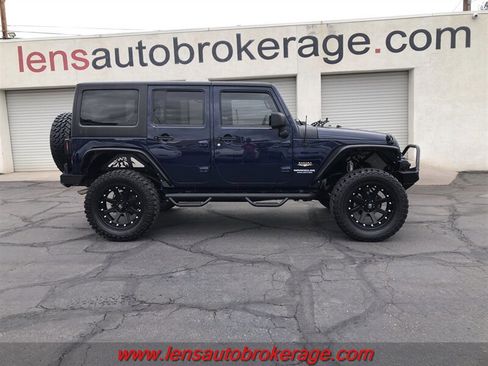 Used 2013 Jeep Wrangler Unlimited Sahara AWD/4WD image 1