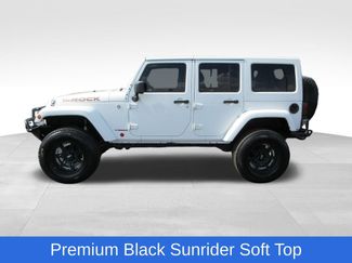Used 2014 Jeep Wrangler Unlimited Sahara w/ Dual Top Group AWD/4WD video 2
