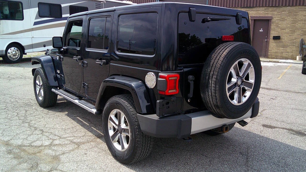 Used 2014 Jeep Wrangler Unlimited Sahara w/ Dual Top Group AWD/4WD image 7