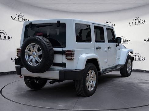 Used 2013 Jeep Wrangler Unlimited Sahara w/ Trailer Tow Group AWD/4WD image 6