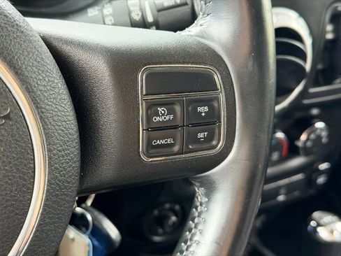 Used 2014 Jeep Wrangler Unlimited Sahara w/ Dual Top Group AWD/4WD image 9