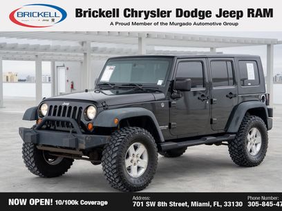 Used 2009 Jeep Wrangler Unlimited Rubicon w/ Dual Top Group