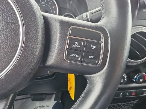 Used 2013 Jeep Wrangler Unlimited Sahara w/ Dual Top Group AWD/4WD image 10
