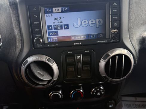 Used 2013 Jeep Wrangler Unlimited Sport w/ Dual Top Group AWD/4WD image 11