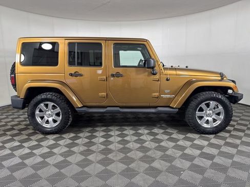 Used 2011 Jeep Wrangler Unlimited 70th Anniversary w/ Dual Top Group AWD/4WD image 2
