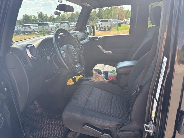 Used 2012 Jeep Wrangler Unlimited Sahara w/ Dual Top Group AWD/4WD image 9