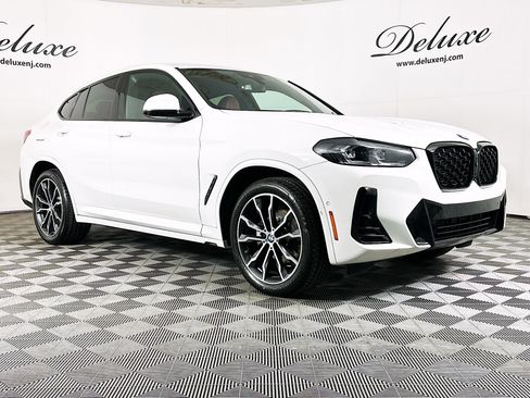 Used 2024 BMW X4 xDrive30i w/ Premium Package AWD/4WD image 1