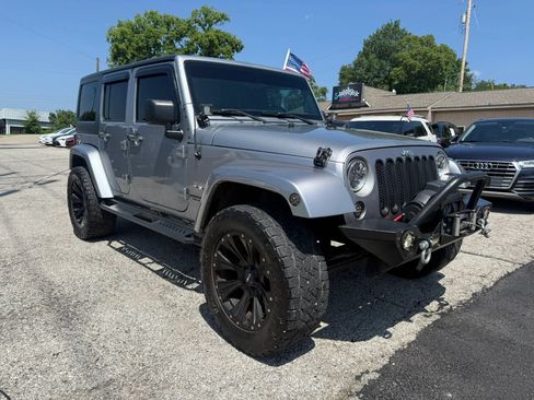Used 2016 Jeep Wrangler Unlimited Sahara AWD/4WD image 1