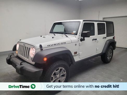 Used 2015 Jeep Wrangler Unlimited Rubicon w/ Connectivity Group AWD/4WD image 1