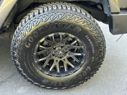 Used 2014 Jeep Wrangler Unlimited Sahara w/ Dual Top Group AWD/4WD image 38