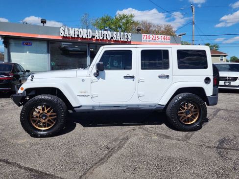 Used 2012 Jeep Wrangler Unlimited Sahara w/ Trailer Tow Group AWD/4WD image 8