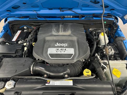 Used 2012 Jeep Wrangler Unlimited Sport AWD/4WD image 24