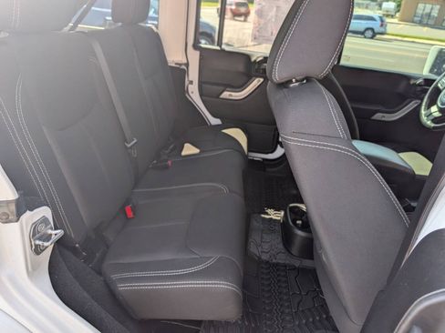 Used 2014 Jeep Wrangler Unlimited Sahara AWD/4WD image 16