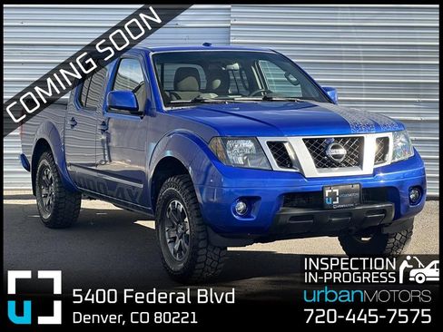 Used 2015 Nissan Frontier PRO-4X image 1