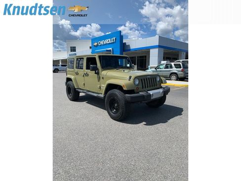 Used 2013 Jeep Wrangler Unlimited Sahara AWD/4WD image 1