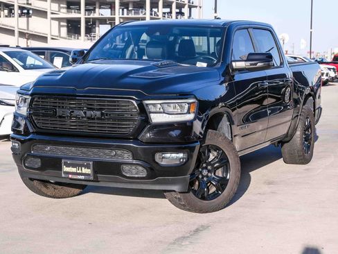Used 2023 RAM 1500 Laramie AWD/4WD image 1