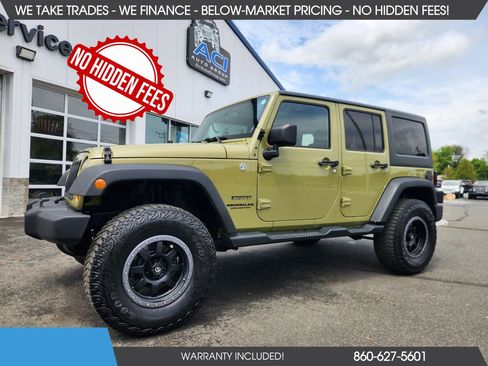 Used 2013 Jeep Wrangler Unlimited Sport AWD/4WD image 1