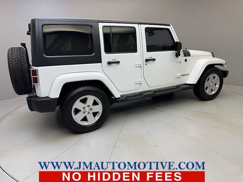 Used 2013 Jeep Wrangler Unlimited Sahara w/ Dual Top Group AWD/4WD image 5