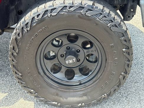Used 2012 Jeep Wrangler Unlimited Rubicon w/ Dual Top Group AWD/4WD image 12