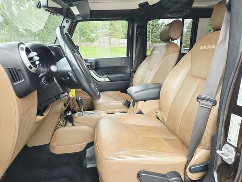Used 2013 Jeep Wrangler Unlimited Sahara w/ Dual Top Group AWD/4WD image 11