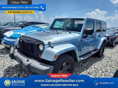 Used 2012 Jeep Wrangler Unlimited Sahara AWD/4WD image 1