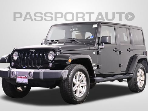 Used 2015 Jeep Wrangler Unlimited Sahara w/ Dual Top Group AWD/4WD image 1