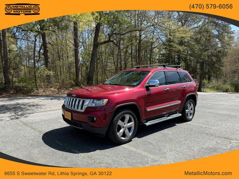 Used 2013 Jeep Grand Cherokee Overland w/ Advance Technology Group AWD/4WD image 1