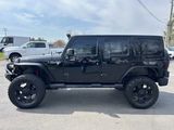 Used 2012 Jeep Wrangler Unlimited Sahara w/ Dual Top Group image 2