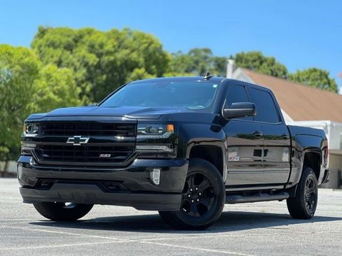 Used 2018 Chevrolet Silverado 1500 LTZ Z71 w/ LTZ Plus Package AWD/4WD image 1