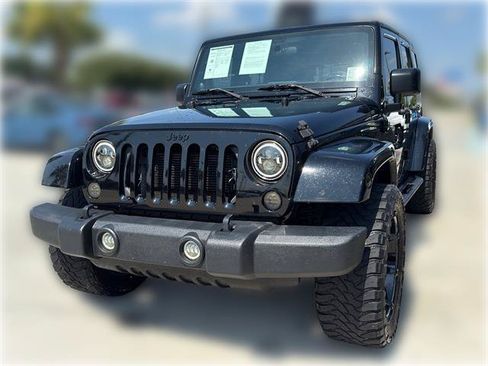 Used 2012 Jeep Wrangler Unlimited Sahara w/ Mopar Chrome Edition Group AWD/4WD image 2