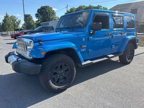 Used 2014 Jeep Wrangler Unlimited Sahara w/ Connectivity Group AWD/4WD image 1