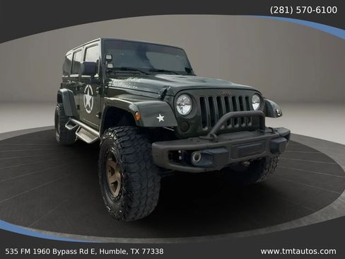 Used 2016 Jeep Wrangler Unlimited Sahara AWD/4WD image 1