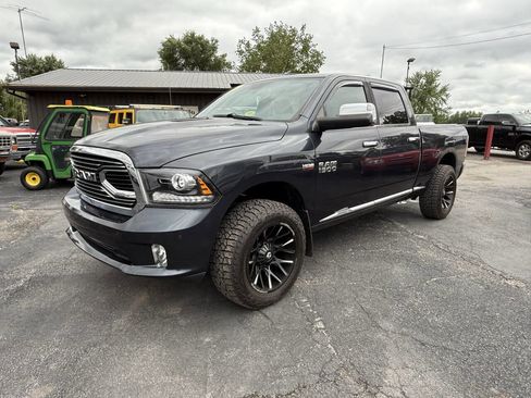 Used 2015 RAM 1500 Limited AWD/4WD image 1
