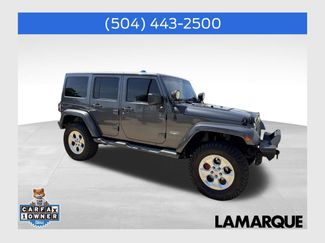 Used 2014 Jeep Wrangler Unlimited Sahara w/ Max Tow Package video 1