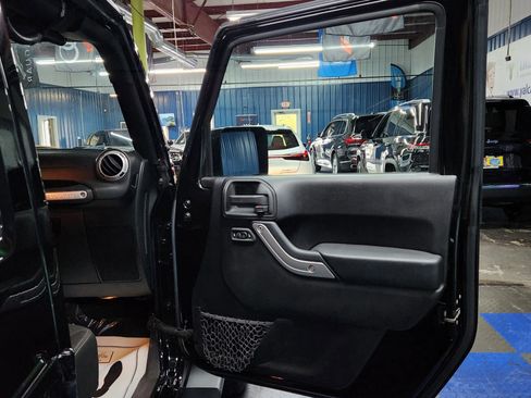 Used 2015 Jeep Wrangler Unlimited Sahara w/ Dual Top Group image 12