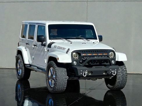 Used 2016 Jeep Wrangler Unlimited Sahara w/ Connectivity Group image 1