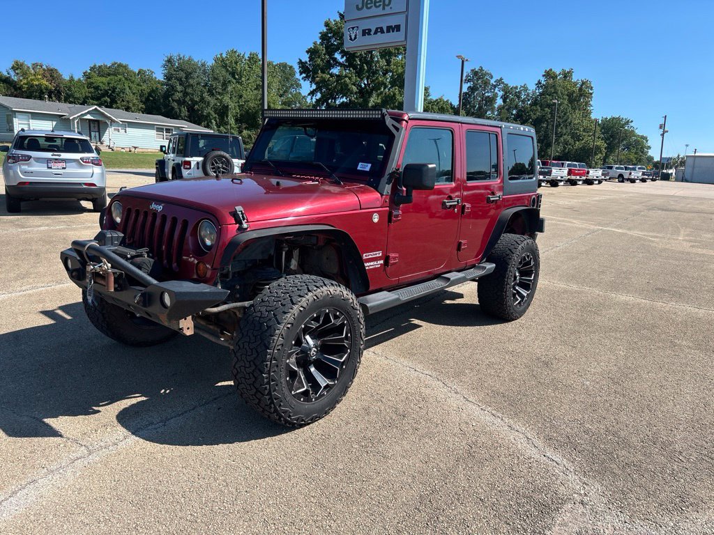 Used 2012 Jeep Wrangler Unlimited Sport AWD/4WD image 1