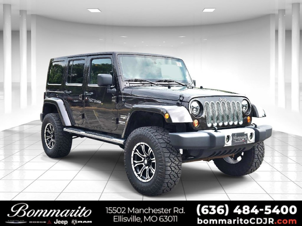 Used 2013 Jeep Wrangler Unlimited Sahara w/ Dual Top Group AWD/4WD image 1